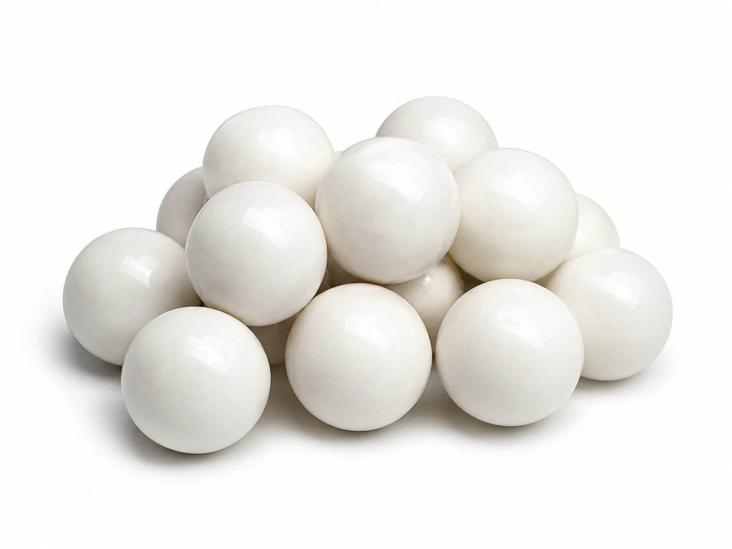 Pile of zirconium oxide grinding balls for reducing particle size during milling