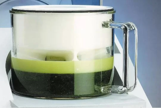 RETSCH GM 200 Knife Mill for homogenizing soft and food samples; grinding container with lettuce, after grinding