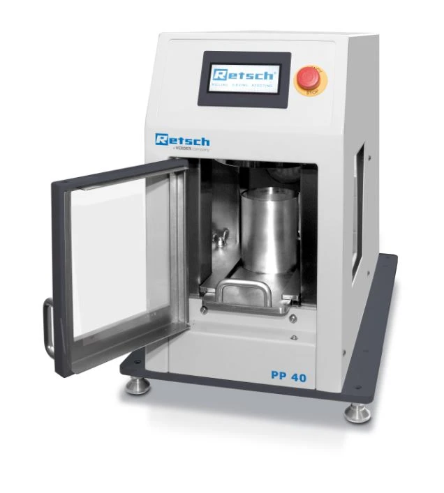 PP 40 automatic pellet press with the door open