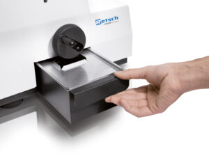 RETSCH BB 50 Jaw Crusher for crushing hard, brittle samples; removing the instrument collecting drawer