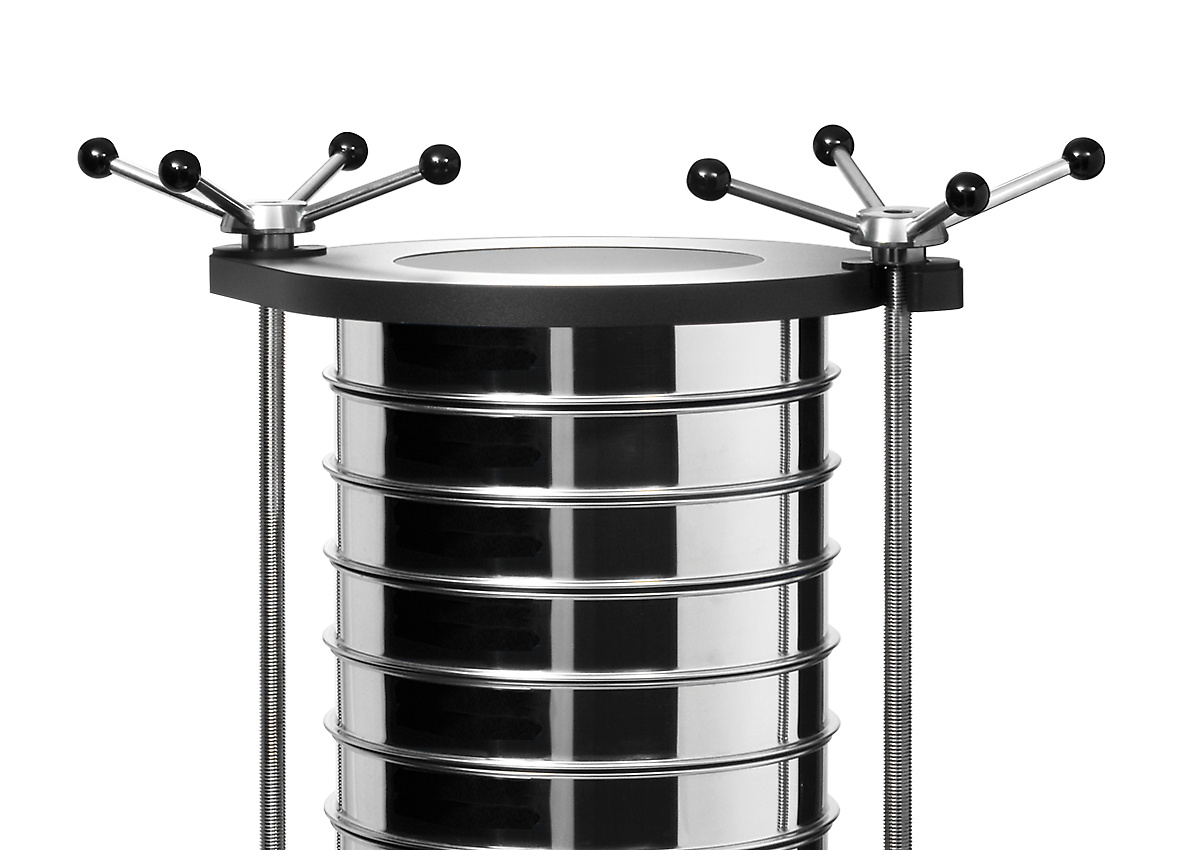 Close-up of the clamping lid on a Retsch sieve stack